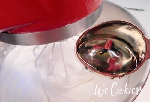 Photo showing adding extract and corn syrup to ingredients 10. Add extract and corn syrup