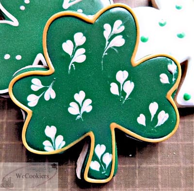 This photo shows a shamrock cookie design with a wet-on-wet technique.