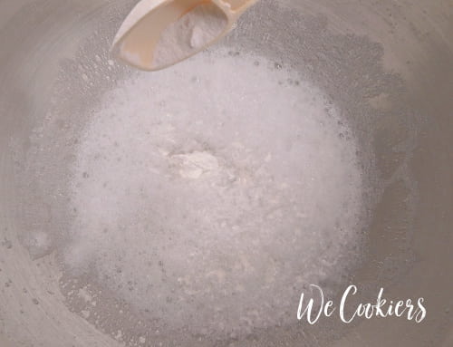 Photo of cream of tartar being added in Step 7. Add in cream of tartar