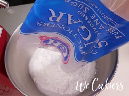 Phot of confectioner's sugar over cream of of tartar 8. Add in confectioner's sugar over cream of tartar