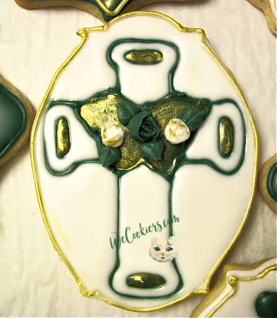 Cross on plaque cookie. Cross is from a Walmart suncatcher pressed into cookie for its shape.