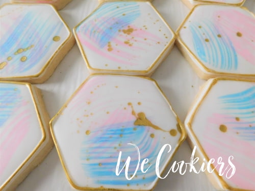 Geometric designed water color cookies Showing water color technique for geometric designs