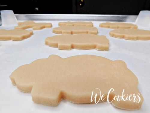 Cut out cookies spaced on cookie sheet