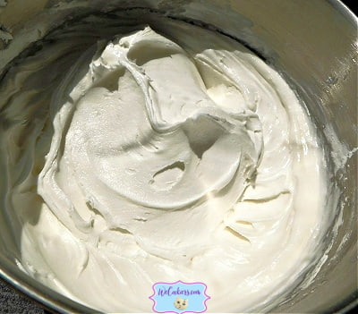 You know your consistency with royal icing is right when it forms peaks and does not meld into the rest. This image shows peaks of the finished royal icing.