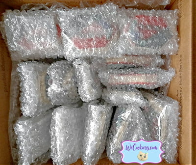Bubble-wrapped cookies are stacked and bubble-wrapped and ready to ship. This image shows the same cookies bubble-wrapped and ready to ship.