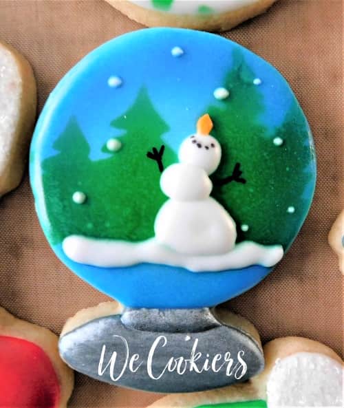 Snowman inside a globe cookie shape, airbrushed