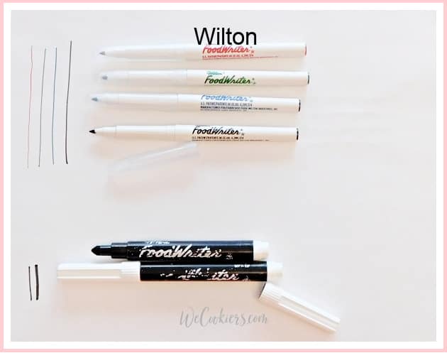Wilton edible food pens. See my reviews on 7 brands on WeCookiers.com Image of Wilton food coloring markers