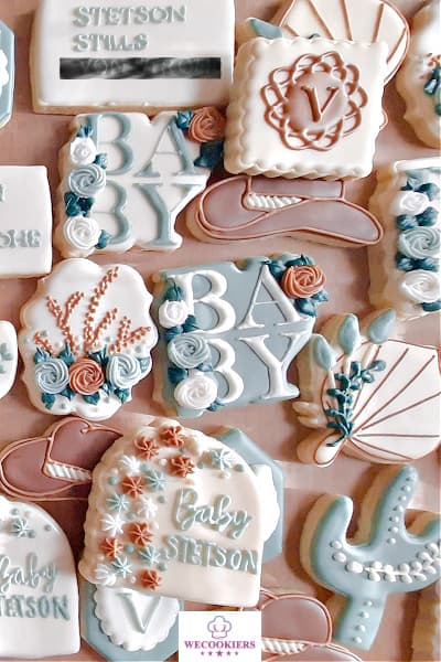 This was a huge order consisting of numerous shapes of cookies celebrating this baby boy shower. See more at: This is a western-themed cookie set for a sweet baby boy's shower. This set was a very large order consisting of numerous cookie cutters used.
