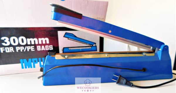 This is the 16" Impulse heat sealer I use for bagging my cookies. Because of its size, I can seal a 12" cookie platter with it. See more: Impulse heat sealer for bagging cookies