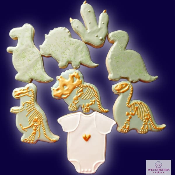 Dinosaur-decorated baby boy shower cookies. I used my pico projector for the bones. See a copious amount of inspiration, techniques, RI templates, and more! Dinosaur-decorated baby boy shower cookies. I used my pico projector for the bones.