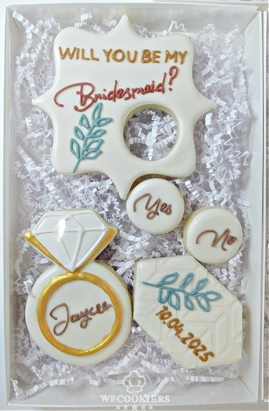 Full set of bridesmaid cookies using the scraping method for decorating cookies.