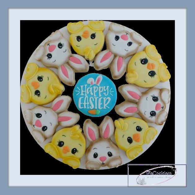 These adorable chick and bunny Easter cookies are perfect for the dessert table. This one was bought through Semi-Sweet Designs and is 12". The image shows a bunny and chick cookie platter from Semi-Sweet Designs. They make for great cookie-decorating ideas.