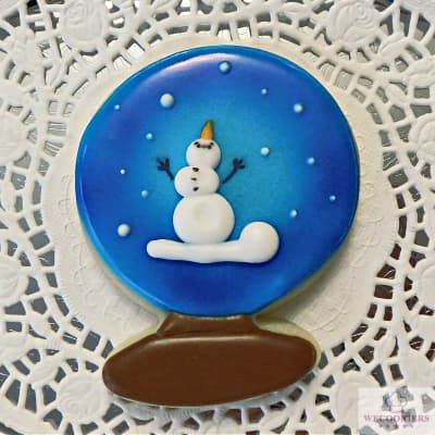 Snowman in a globe cookie