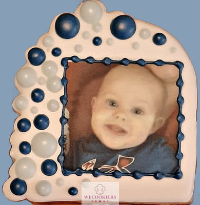 Baby cookies say it all. Edible images are perfect for baby shower cookies, either of the expecting parents, mother, or sonogram. They will always be a hit! Learn more: Edible image of a baby on a cookie with royal icing. I used a balloon arch cutter.