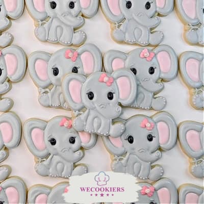These sweet elephants sugar cookies are adorned with the small bow royal icing transfers from the templates in Shop Gotta-havs! Elephant cookies with pink bow royal icing transfers