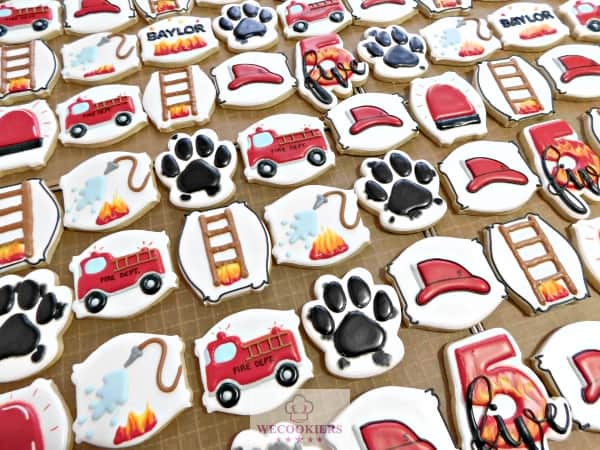 This fireman cookie set was created using the PICO + cookie projector. See more ideas here: https://www.wecookiers.com/sugar-cookie-decorating-ideas.html Firemen cookie set done with a PICO + projector.
