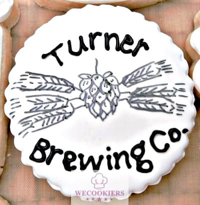 The Turner Brewing Company logo is made with a marker over a stencil.