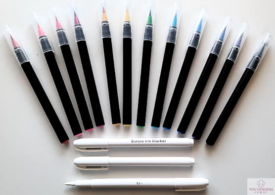 My favorite bold, inexpensive, and long-lasting set of food color markers, the Nomeca brand. Also, a great 3-pack of white food markers. See more tips: Shown is a full set of the bold and colorful Nomeca food color markers. With them, a 3-pack of white food markers.