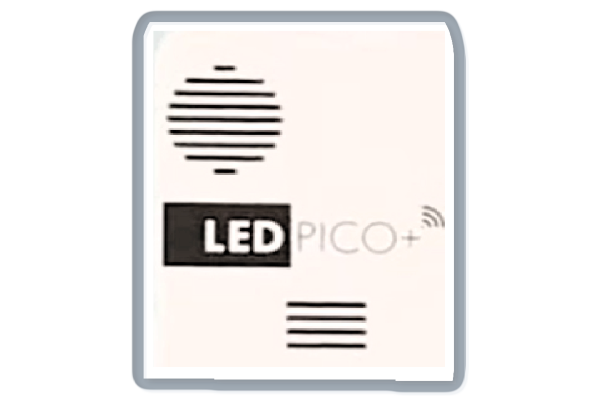This is the speaker on the front of the PICO + projector. Image of the front of the PICO + projector highlighting what the speaker looks like