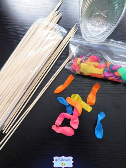 Before starting cookies bouquets, get organized with the supplies you need. Photo showing supplies for cookies on a stick