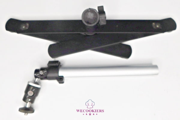 This photo shows how small the tabletop projector stand can fold up to save space when you're not using it. table mount collapsed