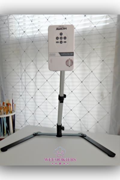 This is a popular mount for a mini projector for a tabletop. Very affordable and portable. Mini projector mount for a table top