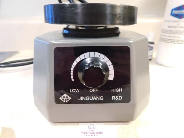 Vibrating plate for use with royal icing or glaze to get rid of air bubbles.